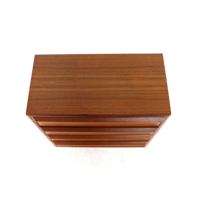 A beautiful Danish chest of drawers with a sleek and timeless design. The “Viborg” model is a beautiful, warm-toned chest...