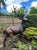 A magnificent life-size bronze sculpture of a twelve-point stag, dramatically modelled standing alert with its head raised...
