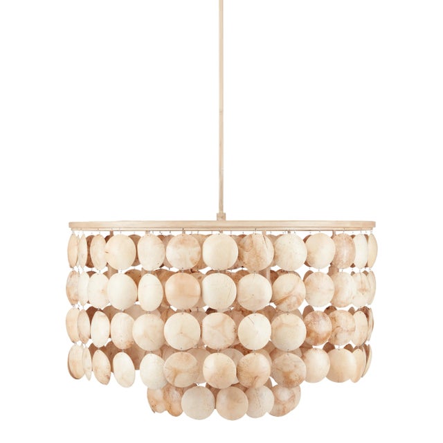 Exploring the shapes that could be achieved with coconut shells inspired the Buko Chandelier. The bulbs on the interior...