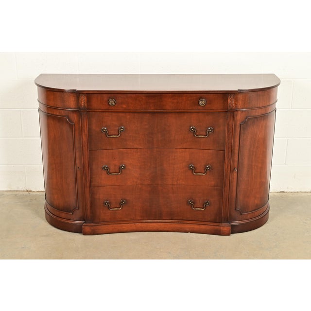 An exceptional Georgian or Chippendale style sideboard buffet or bar cabinet By Charak Furniture USA, 1946 Gorgeous...