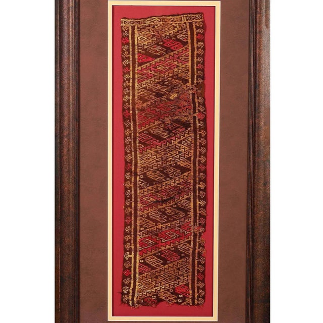 A fragment of antique pre-Columbia textile panel from Chimu or Chancay culture located in Central and Northern Coast of...