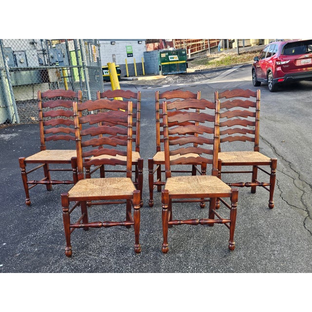 Rare Custom Set of Six English Oak Faux Bamboo frame and Mahogany Six-Splat Ladder Back Chairs with Rush Seats. It is...