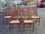 Rare Custom Set of Six English Oak Faux Bamboo frame and Mahogany Six-Splat Ladder Back Chairs with Rush Seats. It is...