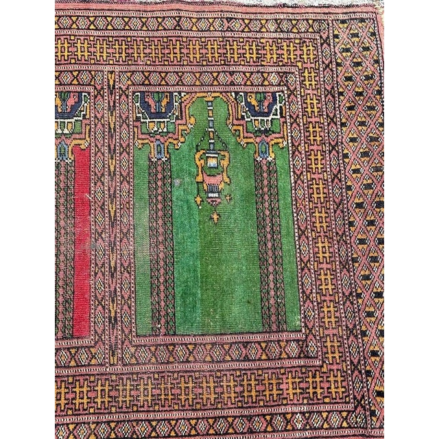 Pretty vintage Pakistani rug with a design of antique saf rugs and beautiful colours with red, green, blue, yellow, pink...