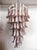 Beautiful and huge Italian Murano Chandelier composed of 83 splendid glass petals (pink and white “lattimo”) that give a...