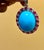 GIA Certified 105 Ct Natural Oval Turquoise, Ruby & Diamond Pendant, Sleeping B For Sale - Image 4 of 18