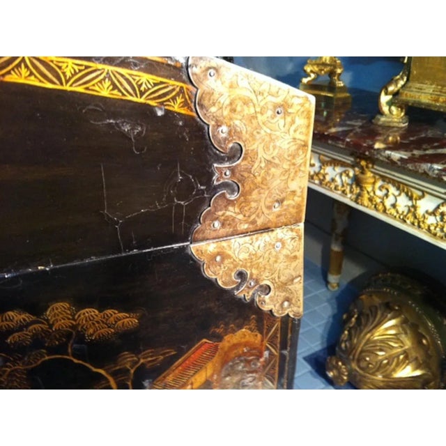 This 18th century lacquered chest is decorated with chinoiserie and mounted on a modern stand. It was produced in the...
