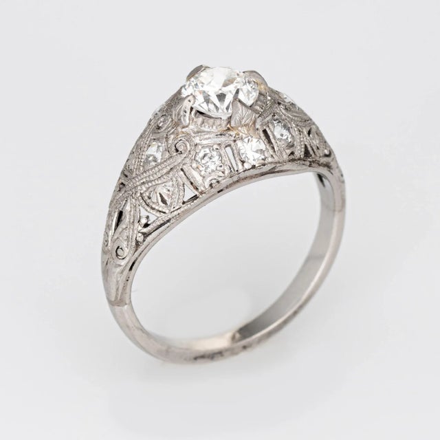 This is part of Chairish’s Fine Jewelry assortment. Finely detailed antique Edwardian diamond engagement ring (circa 1900s...