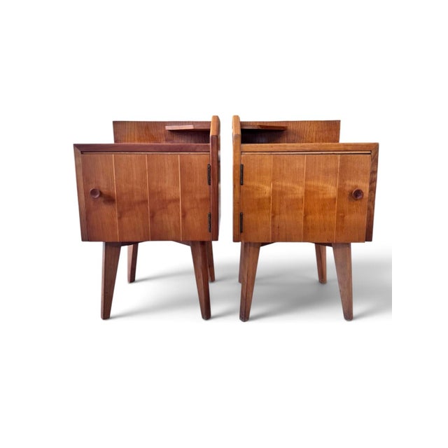 A charming pair of original mid-century bedside cabinets, dating to circa 1960, constructed in beautifully figured maple...