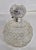 A fine Edwardian cut glass vanity scent bottle dating to 1902, displaying elegant Art Nouveau influences and richly...
