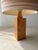 A lamp that adds atmosphere to a room even during the day. This large vintage table lamp from the 1970s combines an...