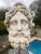 Wonderful marble bust of the roman god of the water neptune. Gorgeous piece standing on a black marble pedestal base....