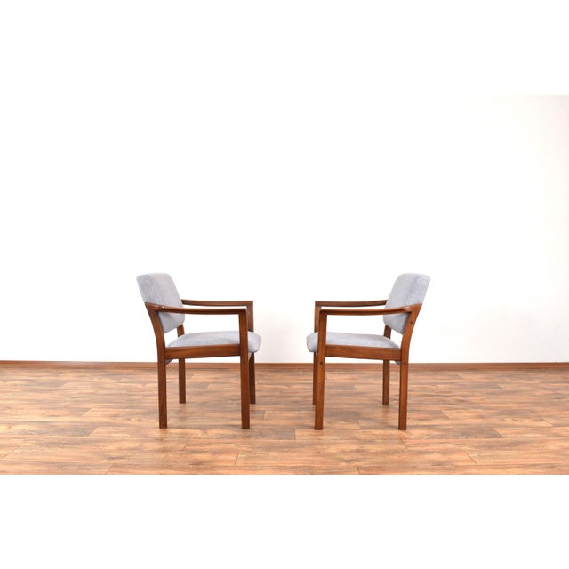 This set of two chairs has made in Denmark in the 70's. The frame of the chairs is made of cherry wood and has been...