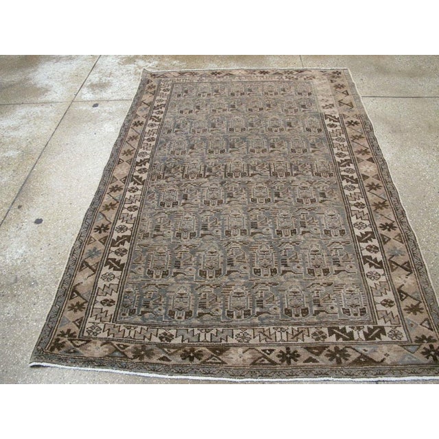 An antique Persian Malayer accent rug handmade during the early 20th century. Measures: 4' 5" x 6' 5"