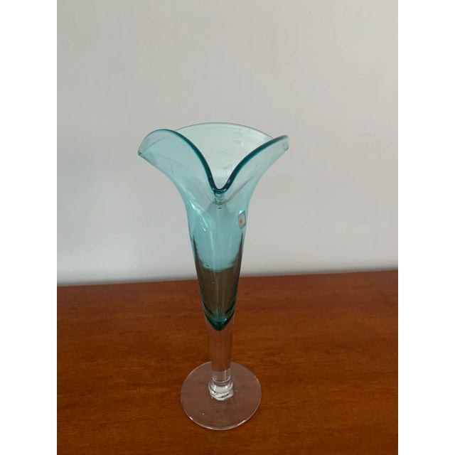 Hand blown glass vase by Blenko Circa 1960s Elegant tulip fluted vase. Tall and sleek. Masterfully made with clear and...