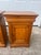 Elegant pair of 19th century Louis Philippe nightstands crafted from warm walnut with clean, classic lines. Each features...