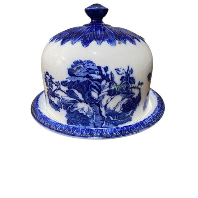 This is a Staffordshire Ironstone Cheese Dome. It is decorated with roses on 4 sides. The dome has 3 holes so the cheese...