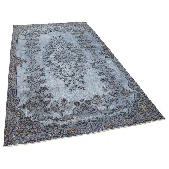 Explore our Hand-carved Over-dyed rugs, where vintage hand-knotted Turkish rugs from the 60s and 70s are given new life....