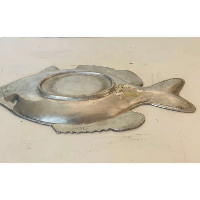 Vintage metal fish shaped platter in. Maripoza style.