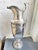 A stunning and rare antique circa 1931 heavy silver plated ice water pitcher from the Hotel Saint Netherland Plaza, in...