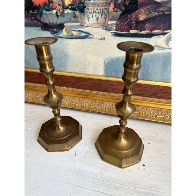 Up for consideration is a beautiful pair of brass candlestick holders. These would look lovely in your home and they are a...