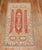Midcentury Turkish rug with a double column scroll prayer motif on red field Size: 3'3" x 6'1".