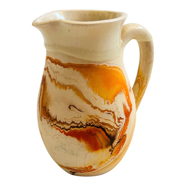 Nemadji Pottery Pitcher - Orange Swirls For Sale