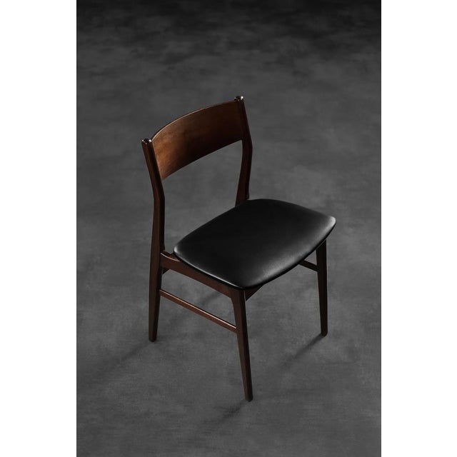 This set of four vintage chairs was made in Denmark during the 1960s. The elegant frame is made of beech wood in a...