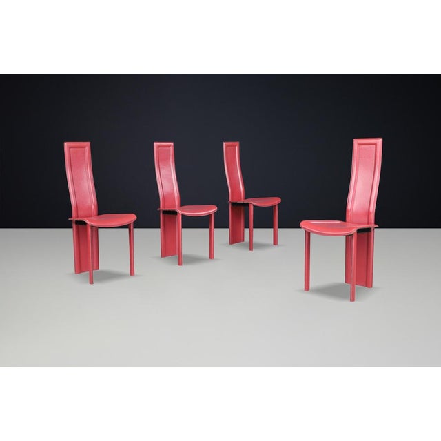 Set of 4 Red Leather ‘Alice’ High Back Dining Chairs by Giorgio Cattelan, Italy, 1980s A striking set of four ‘Alice’...
