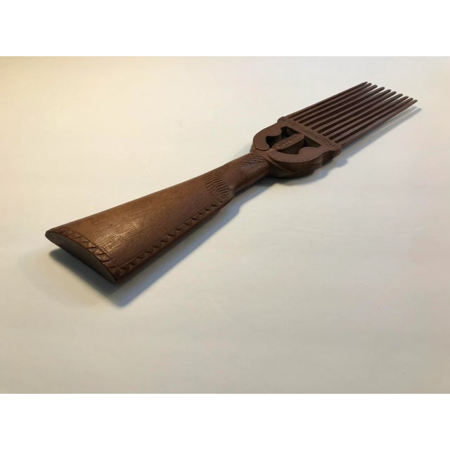 Rare Hand Carved Wooden Suriname Comb circa Early 20th Century Aprox. dimensions: 14" Very good original condition! This...