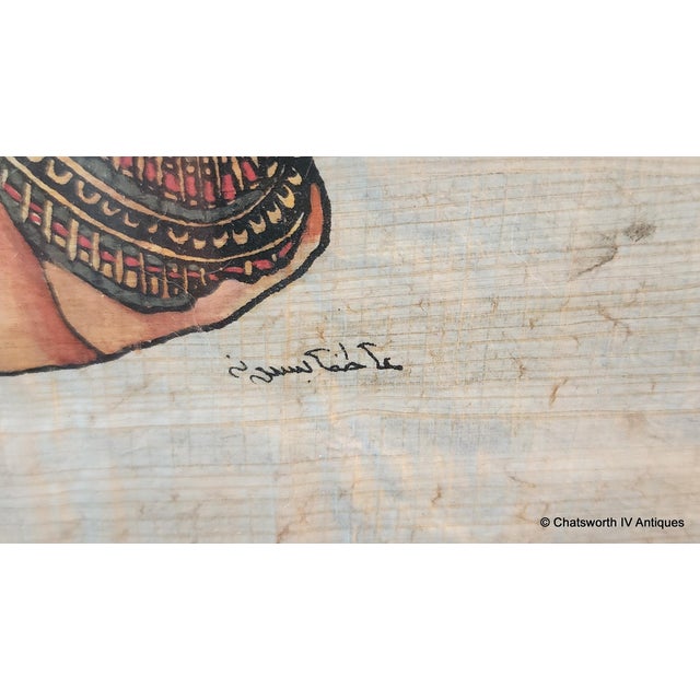 Vintage Framed Hand Painted Papyrus Egyptian Painting Of Nefertiti ~ Signed, 1990s. Gilt bamboo styled wood frame. Framed...