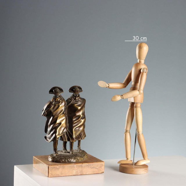 Bronze sculpture depicting a pair of Carabinieri patrolling in a storm, reproduction of the famous work by sculptor...