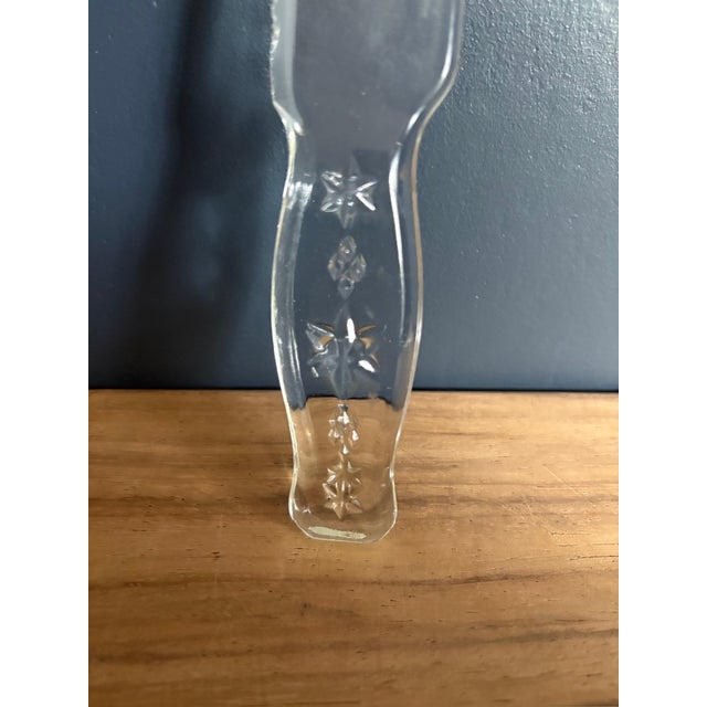 Clear pressed glass fruit and cake knife by Vitex-Glas, American, circa 1938–1940s. Distributed by Renwal of New York and...