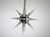 A Large Star Chandelier Custom Designed and Custom made. The main body is all machined to fit all the Acrylic Icicle...