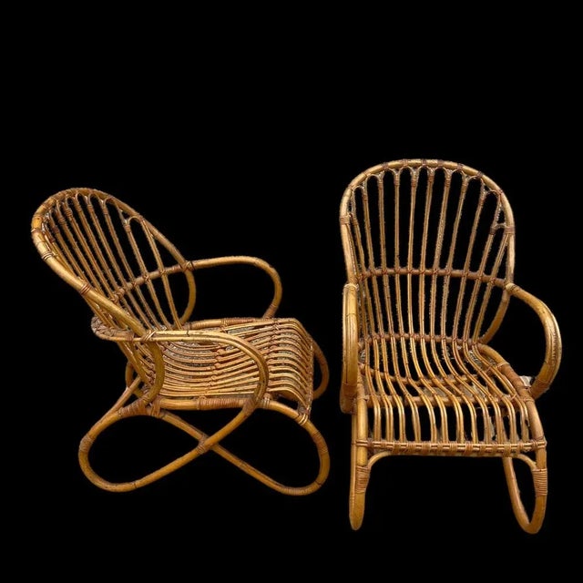 Pair of rattan chairs of the 50s from the Netherlands.