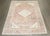 a square 1920s Persian Malayer accent size rug with ivory medallion on a soft red ground