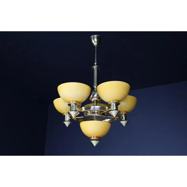 Sculptural italian chandelier in brass & amber-gold opaline glass, 1970s 12 available elegant, architectural, and...