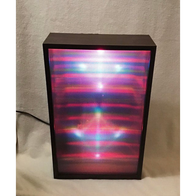 Vintage 1970’s Realistic Color Organ working sound activated disco party strobe light. Colorful lights reacts by...