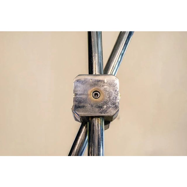 Nine lights lamp with chromed metal structure. Article. Designer Mario Faggian Milan Light Manufacturer 60's I have...