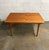 A spectacular Danish teak mid century modern dining table in the style of Hans Wegner. This table screams high quality,...