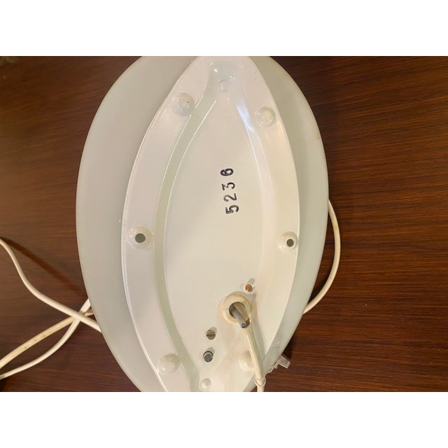 Vintage Wall Light from Peill & Putzler, 1960s, in Flawless conditions. Designed 1960 to 1969 This piece has an...