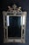 Antique historicism mirror, around 1870, gilded. Richly decorated mirror in historicism around 1870. Framed mirror with...