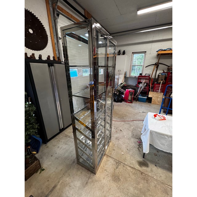Chrome & Glass Wine Display Cabinet with Illuminated Interior. Brand/ Designer is Unknown, but item is extremely well...