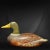 A colorful and detailed wooden duck that is a work of folk art. I love the colors and details. A wooden block has been...