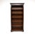A tall and useful antique Georgian style open bookcase, made in England and dating from around the 1950’s. This is of...