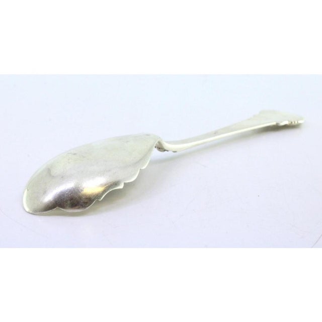 Silver Salad Spoon with Raised Grooves, in Very Good conditions. Designed 1920 to 1949 This piece has an attribution mark,...