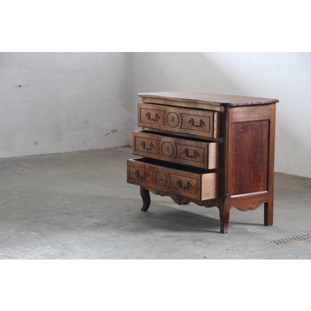 A testament to the refined rustic elegance of the south of france, this exquisite mid 18th-century commode embodies the...