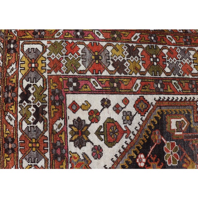 Antique Persian Bakhtiar Gallery Rug Featuring a Multi-Medallion Tribal Design For Sale - Image 13 of 16