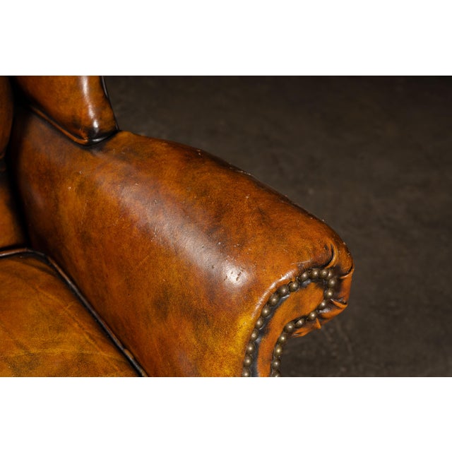 Mid 20th Century Tufted Leather Wingback Armchair in Amber For Sale - Image 9 of 9