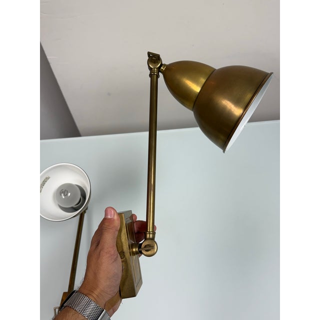 Design Plus Gallery presents a Pair of French Library Single Arm Wall Lamps by Visual Comfort & Co. Signature Collection....
